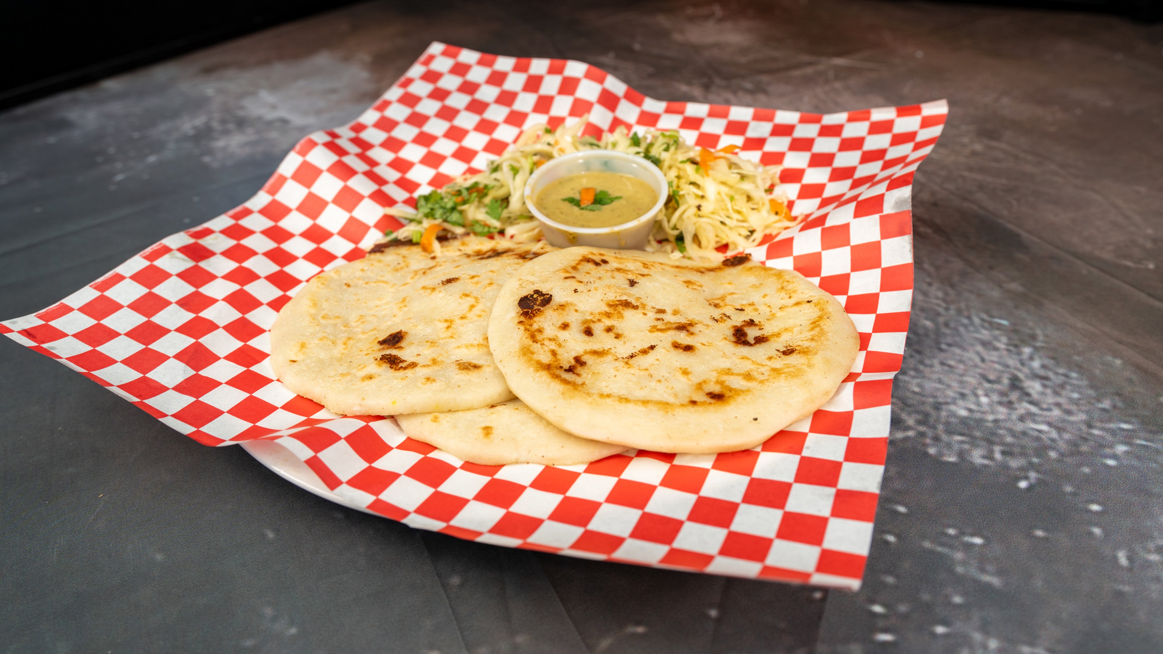 Pupusas with curtido and salsa